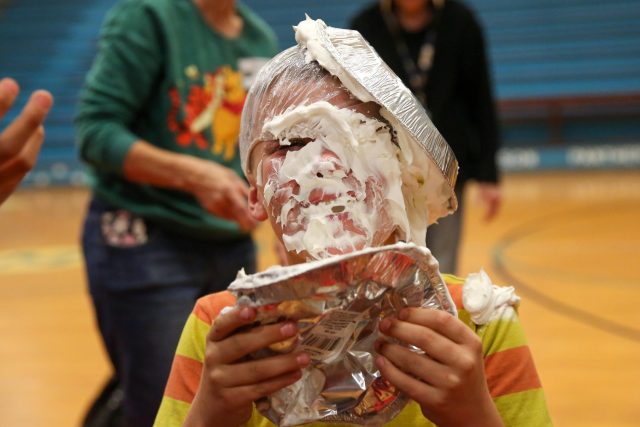 student pies himself in face